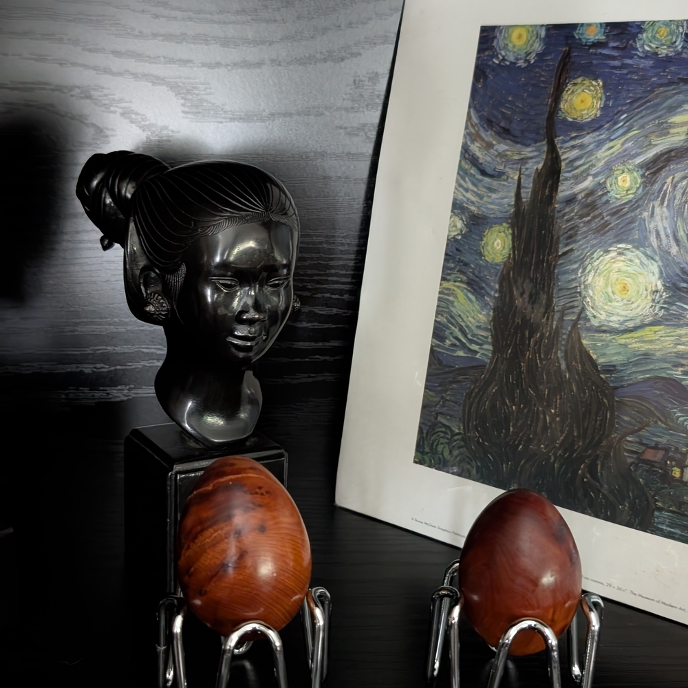 Black Bust Sculpture with Brown Decorative Eggs